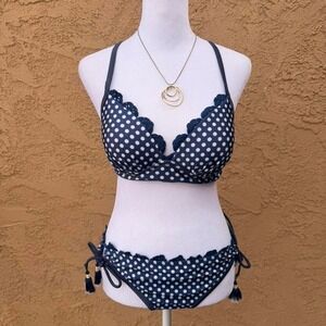 Navy polka dot bikini with tassels and crochet trim